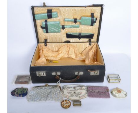 A collection of vintage 20th century ladies curios to include a a pair of early 20th century brass glazed jewellery caskets, 