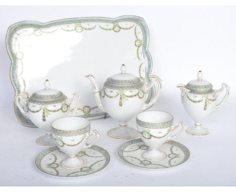 A Victorian early 20th century Austrian Viennese crown fine bone china coffee service. The lot to include a coffee pot, a sug