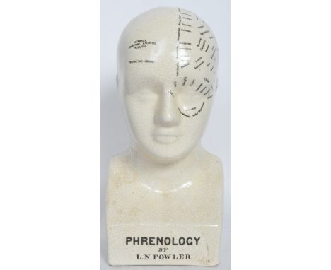 A vintage 20th century ceramic phrenology head / bust by L N Fowler having male features with script to the front, side and r