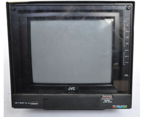 A vintage JVC&nbsp;tm-9opsn four system colour video / rgb monitor television. Serial no. 6504561. Black cased with white let