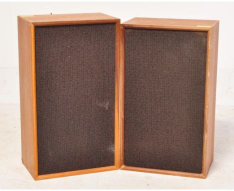 A pair of vintage mid 20th century teak cased speakers with grey clothed front. Each speaker measuring approx.&nbsp;