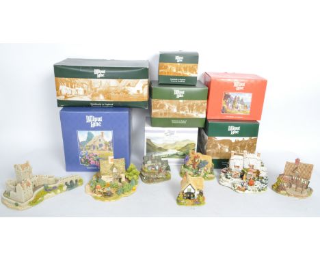 A collection of boxed vintage 20th century Lilliput Lane sculptures to include Eilean Donan Castle L2789, Cruch End 855, The 