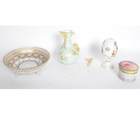 An assortment of 19th century Victorian and later bone china items to include a Royal Worcester hand painted vase with face t