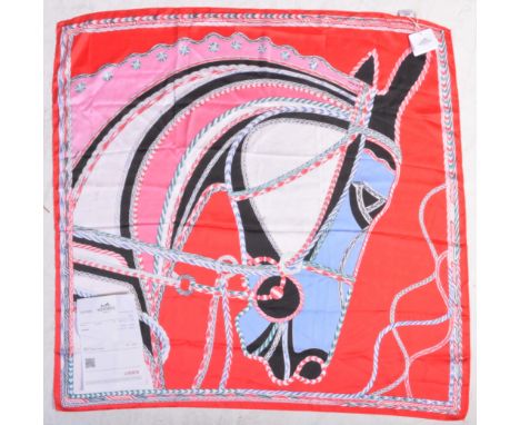 A contemporary Hermes of Paris / Robe du Soir silk scarf having cord motifs in the form of a horse. Comes with original bag a