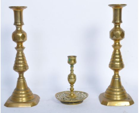 A pair of vintage 20th century brass beehive candlesticks marked England to base, together with an early 20th century ecclesi