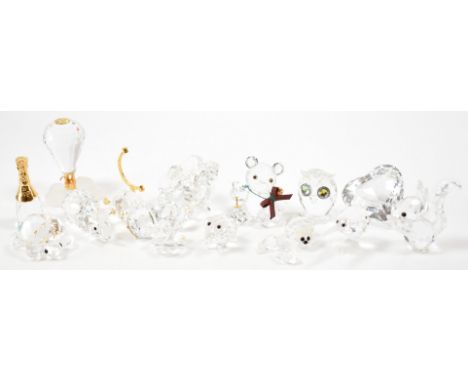 A selection of late 20th Century swarovski crystal animals. The lot to include a pig, tortoise, owl, clam, squirrel, kiwi, rh