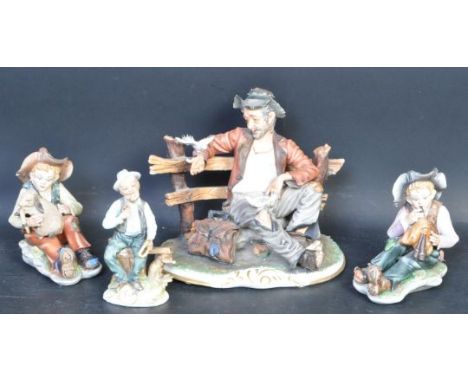 A collection of four vintage 20th century Capodimonte ceramic figurines comprising of a vagrant sat on a bench, man smoking a