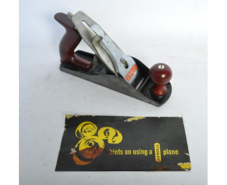 A vintage 20th century Stanley bench plane woodworking tool having a beech handle with maker mark to the front. Comes with bo