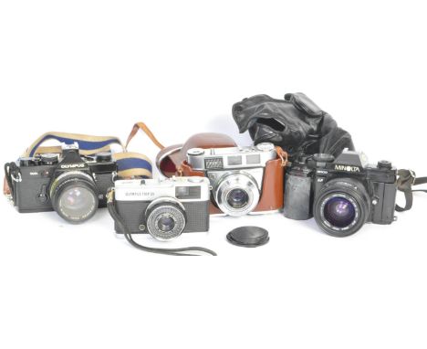 A collection of vintage 20th century cameras and lenses to include a Retinette IB model no. 109422 with Reomar 1:2,8/45mm, a 