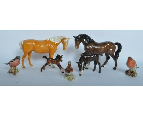 Beswick &amp; Royal Doulton - An assortment of vintage 20th century bone china figurines to include a selection of Beswick br