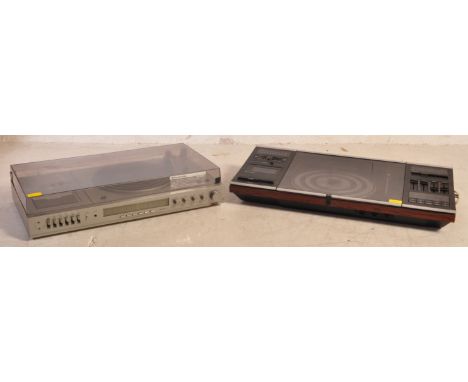 A retro vintage mid 20th century Bang &amp; Olufsen Beocenter 2002 having a tape deck, turntable and radio. Together with a P