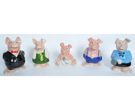 
A collection of vintage 20th century Wade Natwest ceramic Pigs / Piggybanks comprising of Father, Mother, Son, Daughter &amp