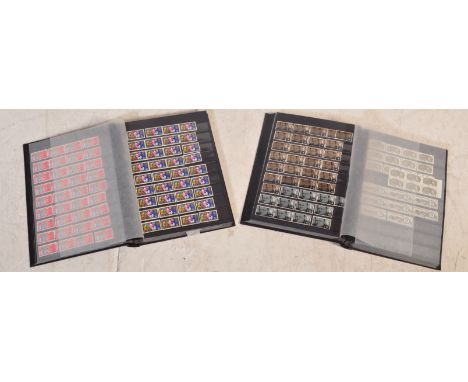A collection of vintage 20th century UK unused pre decimal stamps. 2 Volumes in total.&nbsp;