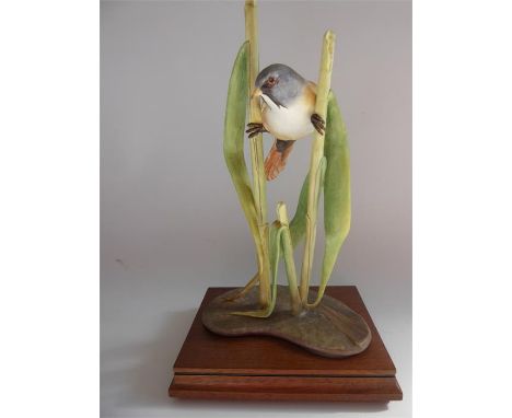 A Limited Edition Royal Worcester Bird Figurine, entitled 'Bearded Reedling', no 128/500, with original certificate.