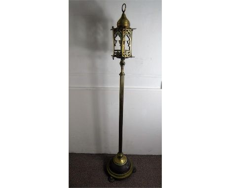 A Victorian Brass Moorish Telescopic Brass Floor Lamp, with circle finial, approx 170 cms high.