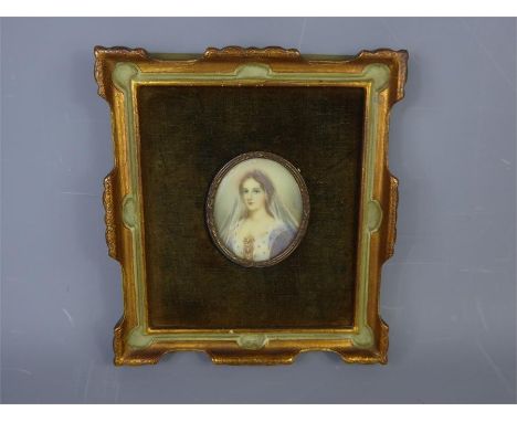 A Portrait Miniature, depicting a young woman wearing a veil, approx 6 x 7 cms, signed lower right Alex.&nbsp;