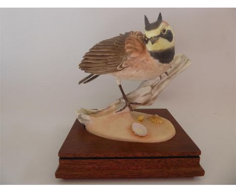 A Limited Edition Royal Worcester Bird Figurine, entitled 'Shore Lark', no 147/500, with original certificate.