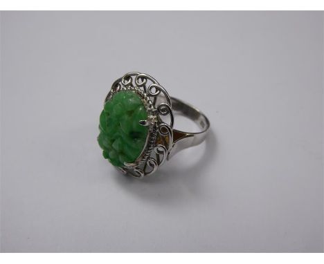 A Chinese 14ct/15 ct&nbsp; White Gold and Apple Jade Ring, size L, approx 5.6 gms.