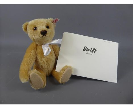 A Steiff Blond Queen Elizabeth II Coronation Mohair Teddy Bear, exclusive to Danbury Mint, approx 28 cms high, limited editio