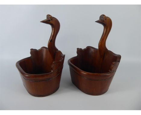 A Pair of Chinese Wooden Water Containers, the handles carved as swans heads (bears the Shanghai Antiquities Approval Export 