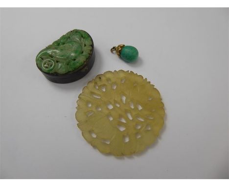 A Chinese Apple Jade Pill Box, approx 38 x 26 x 14 mm together with a white jade amulet approx 50 mm diameter together with a