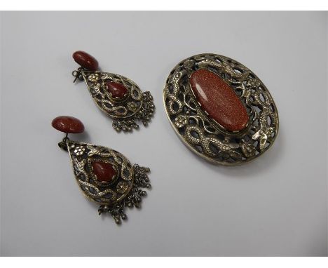 A Chinese Silver-Metal and Gold-stone Glass Brooch and Earrings, approx 67 x 50 mm and the earrings approx 42 x 24 mm, set in