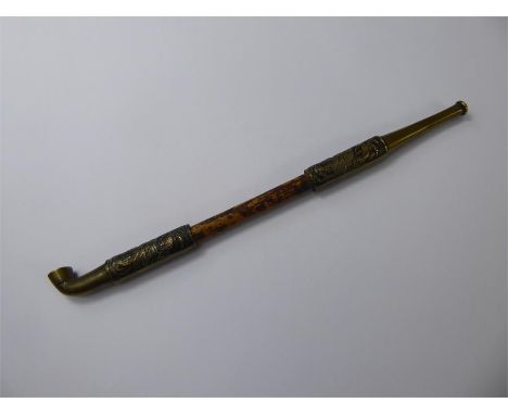 A 19th Century Antique Japanese Kiseru Bamboo and Brass Smoking Pipe, the brass bowl and mouth piece being decorated with dra