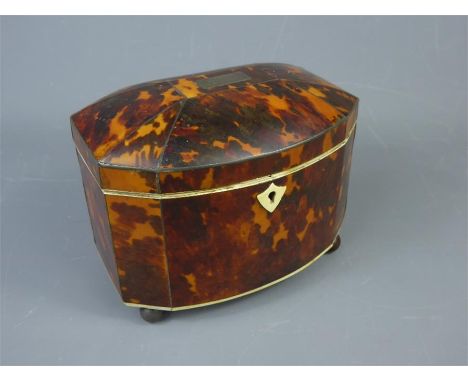 Georgian Tortoiseshell Tea Caddy, of rectangular form with domed cover, inlaid white metal and ivory stringing, the interior 