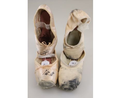 A pair of lady's size 4 1/2 pink silk ballet shoes,  signed by Nao Sakuma of the Michiko Komori Ballet School, together with 