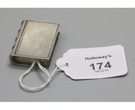A William IV vinaigrette, in the form of a book, engine turned to cover, spine and base, concealed hinged cover opening to re