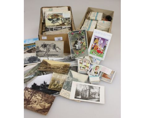 A collection of vintage postcards, including topographical, humorous and others, together with a large quantity of cigarette 