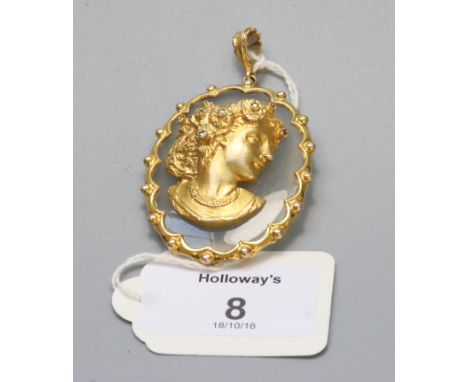 A 9ct gold and diamond and stone set cameo pendant, oval with scalloped edge, the female bust portrait with diamond detailing