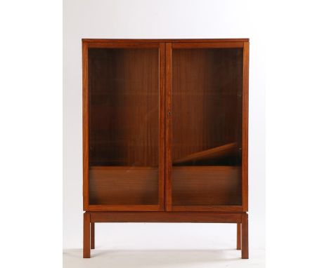 20th Century teak bookcase, with two glazed doors opening to reveal two interior shelves, military broad arrow and NATO stamp