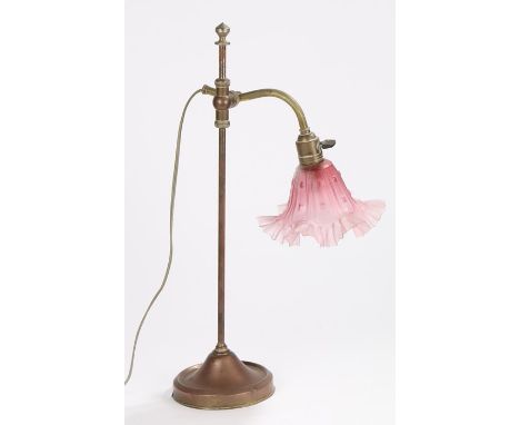 20th Century brass and copper reading lamp, with frilled puce glass shade and adjustable column, 50cm high
