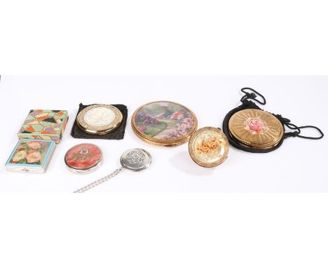 Collection of seven vintage compacts to include a 1958 Kigu flower "Bouquet" basket with hinged carrying handle with a Lucite