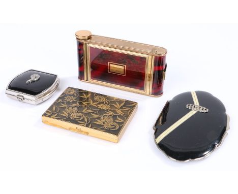 Art Deco oval shaped compact in black and cream enamel decorated with marcasite, German Art Deco camera compact in red tortoi