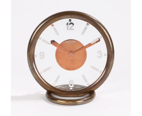 Jaeger Art Deco mantel clock, the circular copper case housing the signed glass dial with silvered Arabic and baton markers, 