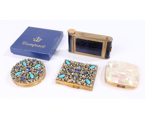 Art Deco camera compact in blue "tortoiseshell" enamel with a cigarette holder, money clip and lipstick holder; vintage mothe