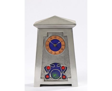Art Nouveau style mantel clock, the shaped pediment above a copper effect chapter ring with Roman numerals above a pierced po