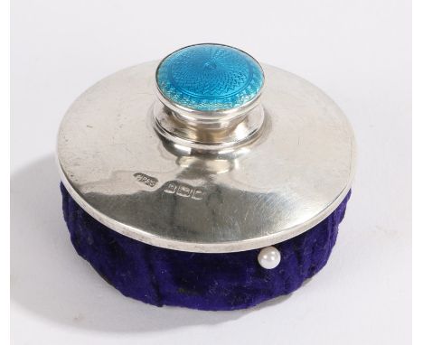 George V silver mounted pin cushion, with turquoise enamel finial and blue velvet cushion, 5cm diameter