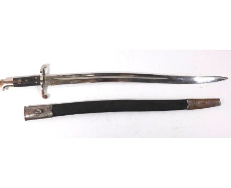 A British 1856/58 bayonet57.5cm yatagan blade, with knurled grips, complete with metal mounted leather scabbard.  A British 1