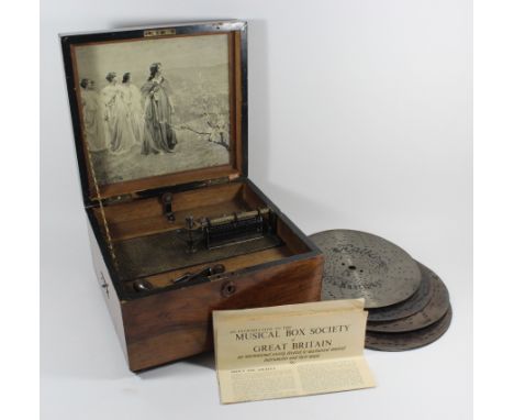 An early 20th Century Polyphon music boxThe movement no. 50985, no further marks apparent, set in a mahogany and inlaid case 