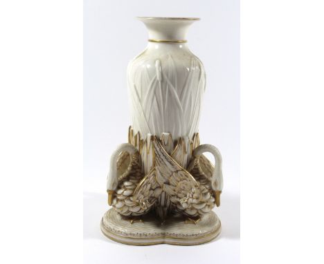 A 19th Century Worcester vaseModelled with a central vase relief decorated with water reeds and three gilt highlights swans t