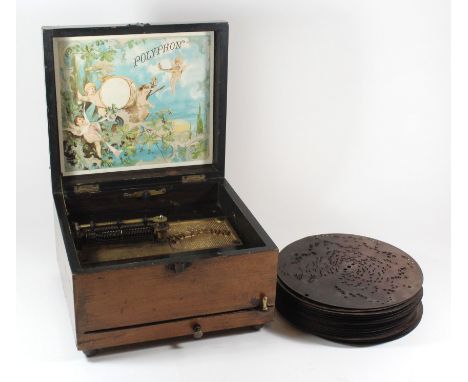 A 19th Century Polyphon music boxOf typical form, together with a quantity of discs, the box marked to interior Schutz Marke,