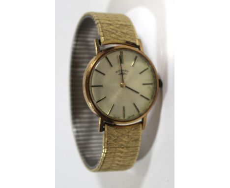A gents 9ct gold cased Rotary wristwatch The circular dial with Roman numerals, diameter 33mm  A gents 9ct gold cased Rotary 