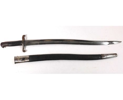 A British 1856/58 bayonet57.5cm yatagan blade,  with knurled grips, complete with metal mounted leather scabbard.  A British 