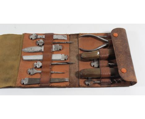 A Vintage German travelling tool kit, marked BonsaIn a fitted leather pouch, containing thirteen various tools  A Vintage Ger