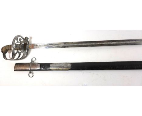 An 1827 pattern Victorian Light Infantry Officers sword82cm curved single edged single fullered blade with acid etched decora