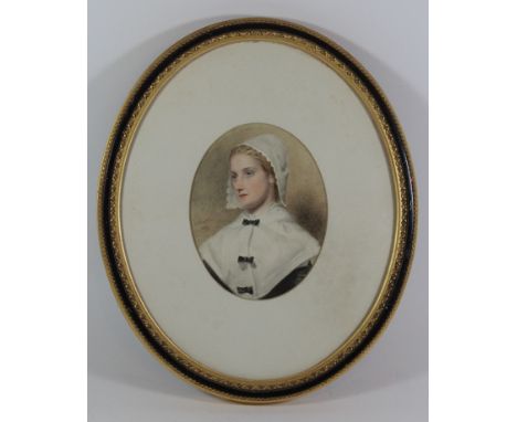Frederick Smallfield (1829-1915) - An oval portrait of a young ladyWatercolour, signed and dated 1859, framed and glazed, 17x