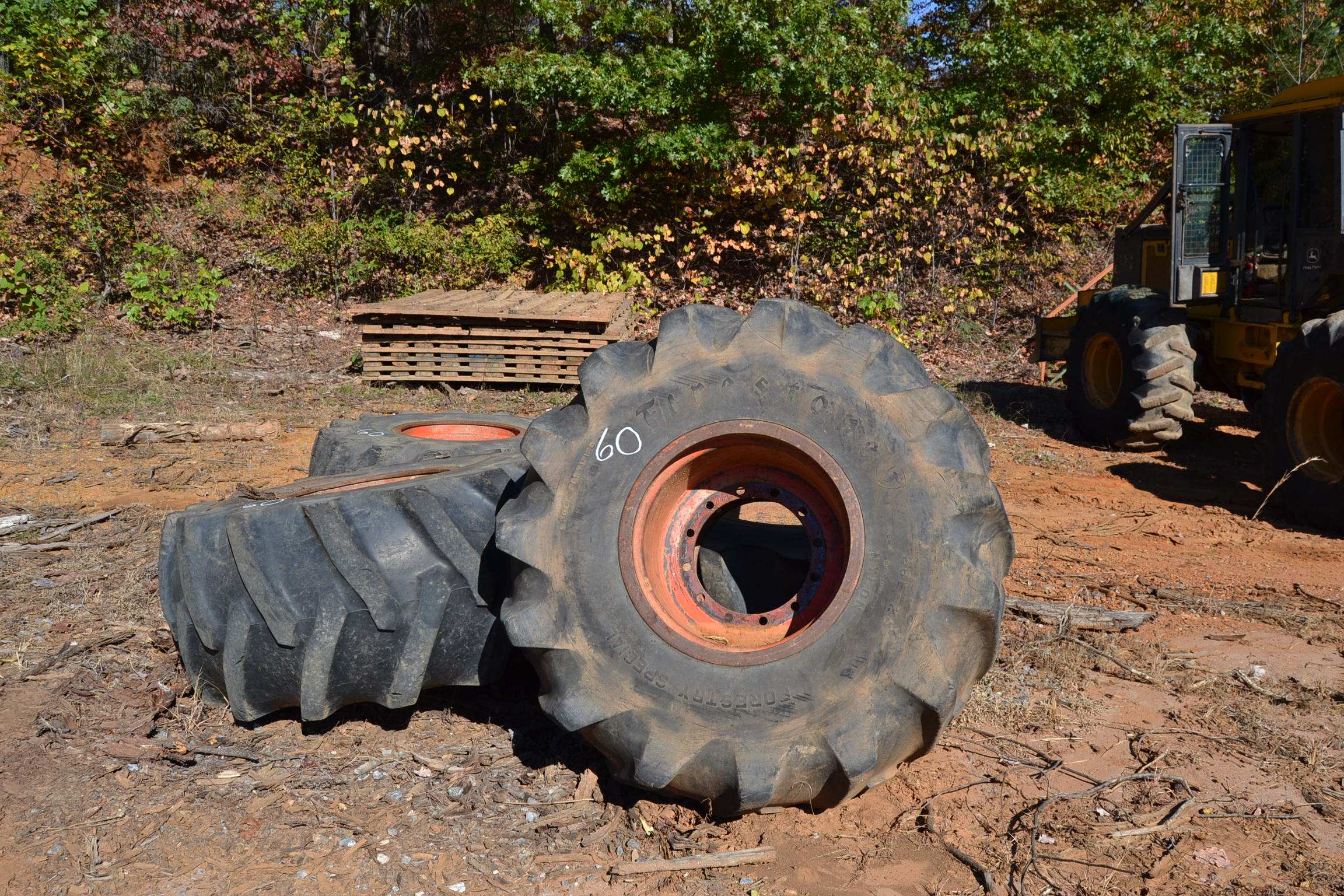 (4) 28L X 26 TIRES ON TIMBERJACK WHEELS